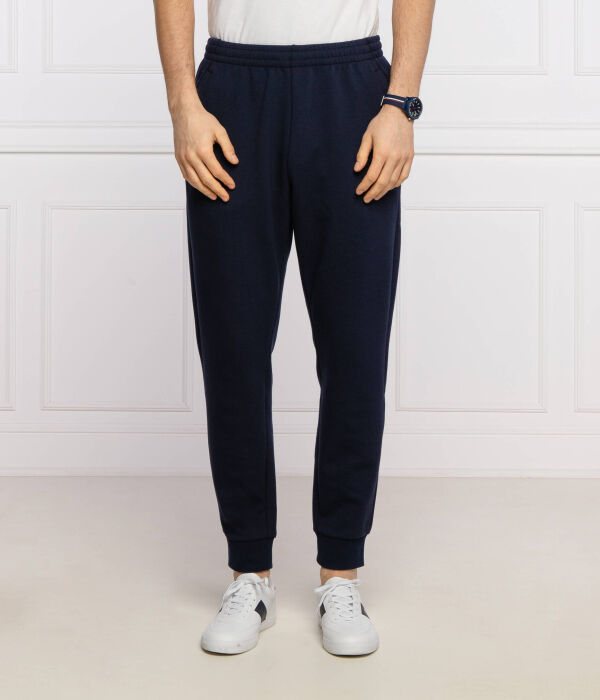 Спортивные штаны мужские Lacoste зауженные, темно-синий 
Спортивные штаны мужские Lacoste зауженные, темно-синий