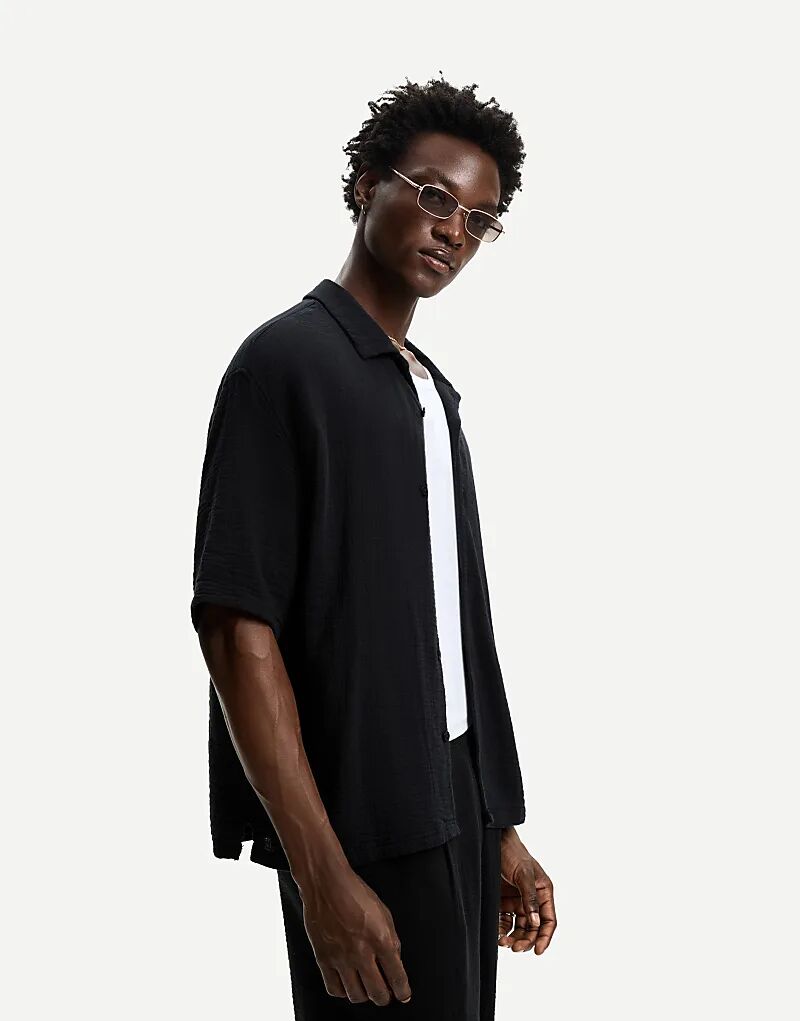 Текстурированная рубашка Bershka с короткими рукавами черного цвета
Текстурированная рубашка Bershka с короткими рукавами черного цвета