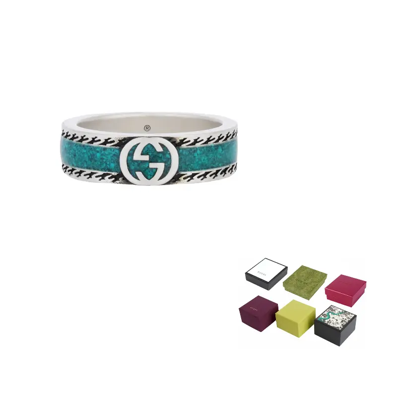 GUCCI Кольцо с переплетающейся буквой G и бирюзовой эмалью
GUCCI Кольцо с переплетающейся буквой G и бирюзовой эмалью