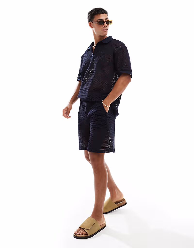 Пляжная рубашка Sol Beach открытого кроя темно-синего цвета
Пляжная рубашка Sol Beach открытого кроя темно-синего цвета