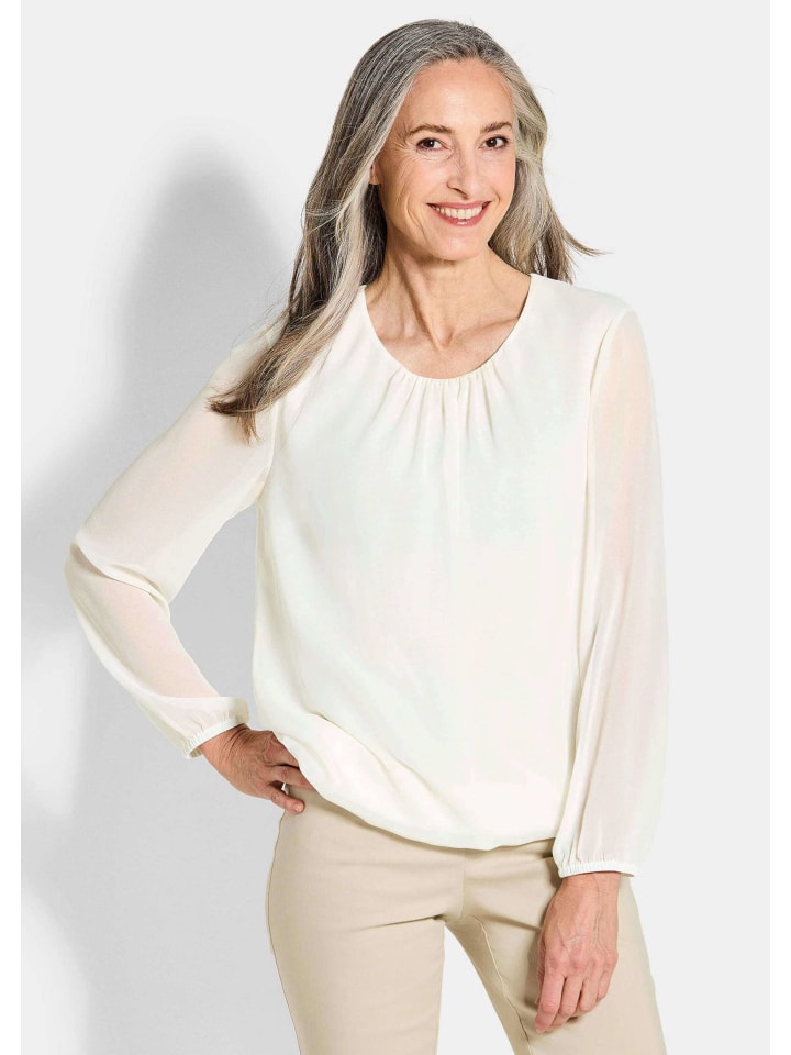 Элегантная шифоновая блузка кремово-белого цвета GOLDNER
Элегантная шифоновая блузка кремово-белого цвета GOLDNER