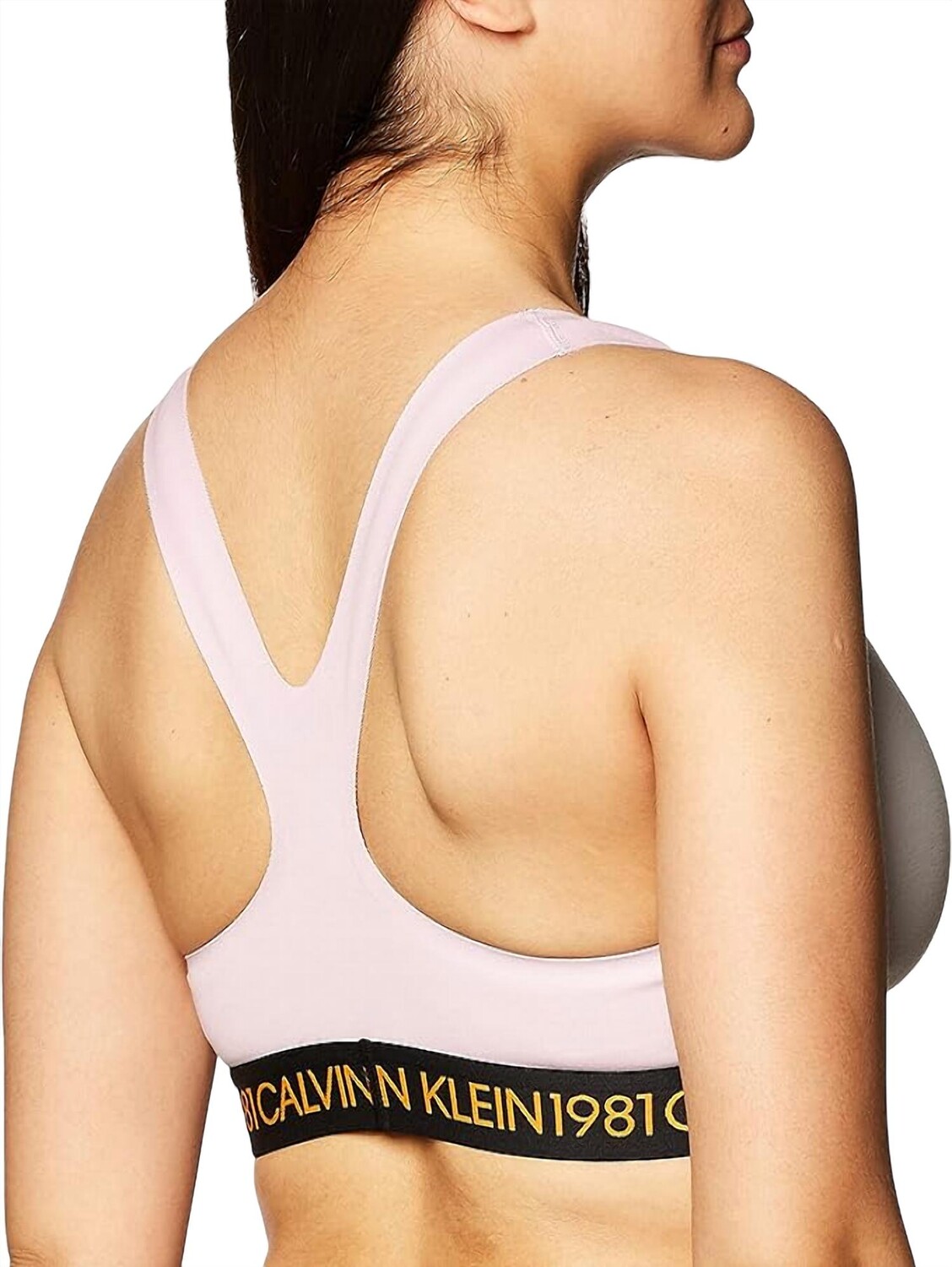 Розовый бюстгальтер без подкладки 1981 года Calvin Klein
Розовый бюстгальтер без подкладки 1981 года Calvin Klein