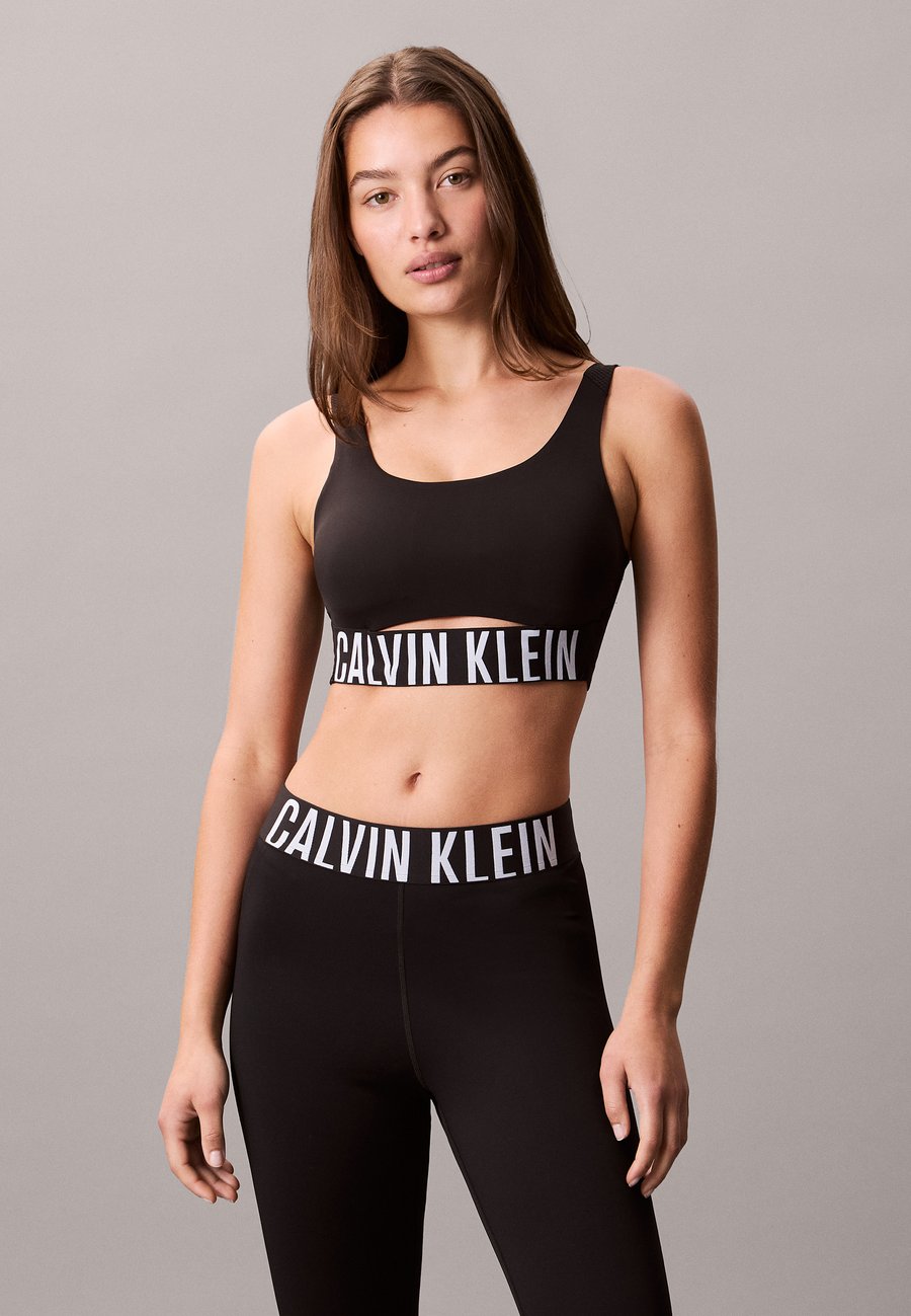 Топ Calvin Klein SPORT INTENSE POWER MEDIUM BRA, Black
Топ Calvin Klein SPORT INTENSE POWER MEDIUM BRA, Black