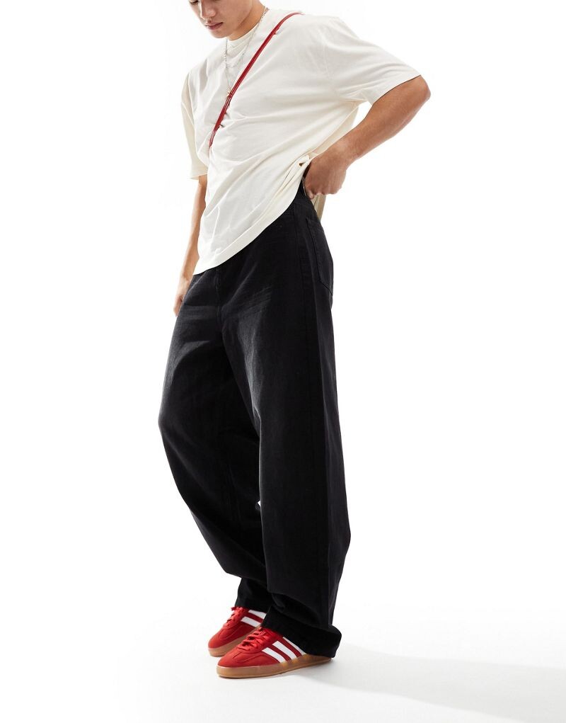 Черные мешковатые джинсы средней посадки COLLUSION X014
Черные мешковатые джинсы средней посадки COLLUSION X014