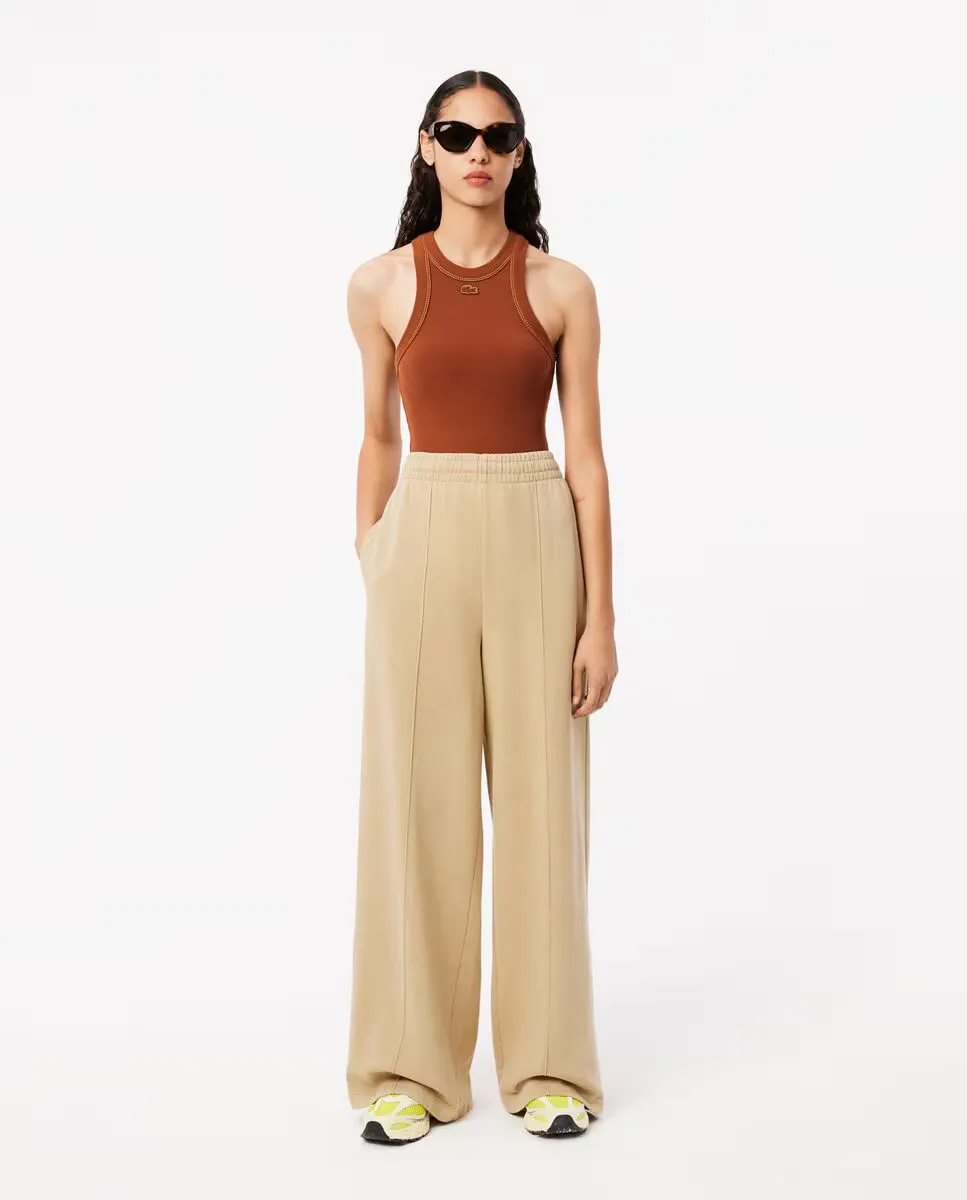 Женские широкие спортивные брюки с логотипом Lacoste, бежевый
Женские широкие спортивные брюки с логотипом Lacoste, бежевый