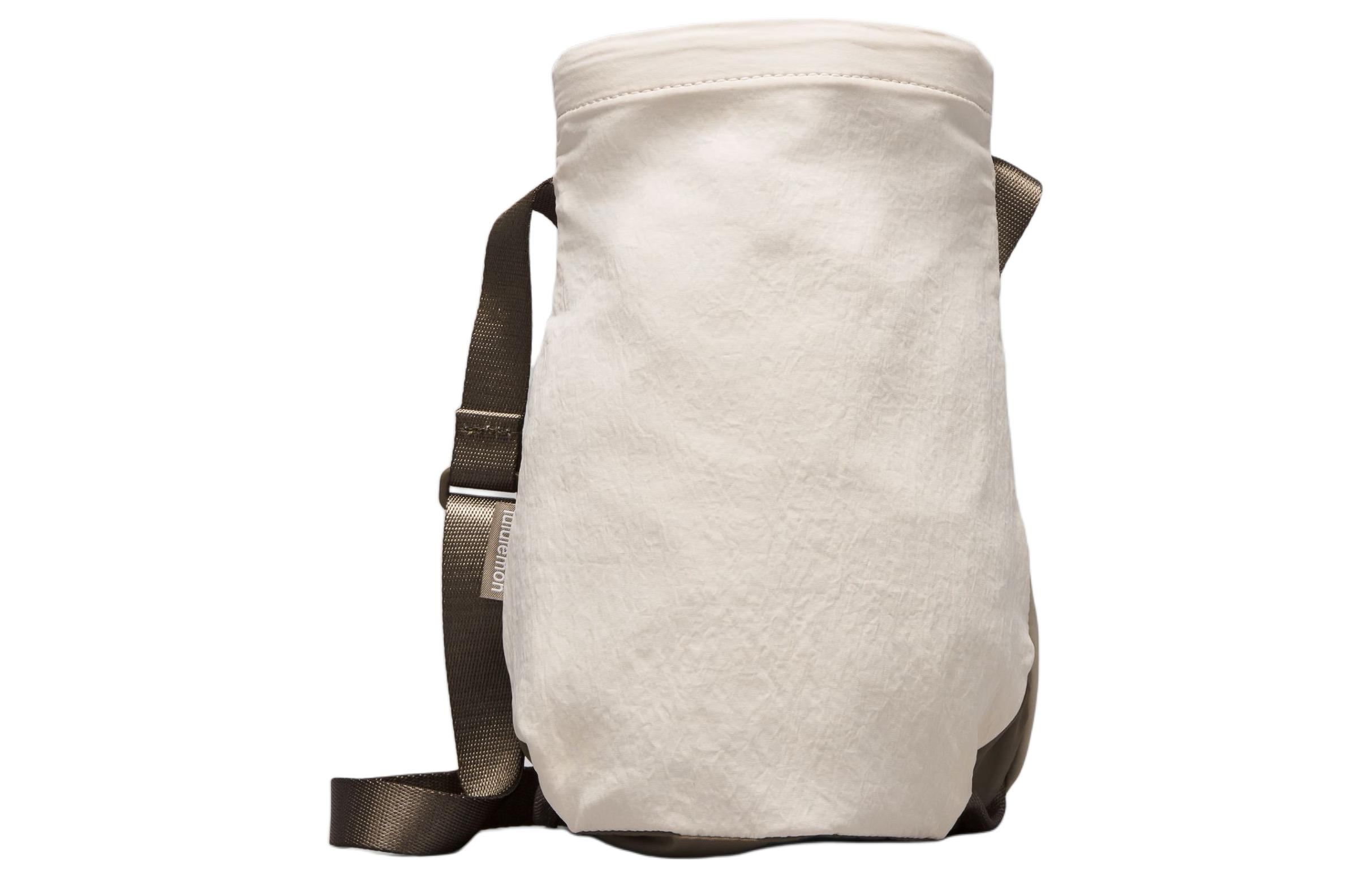 Lululemon Водонепроницаемая сумка для бутылки с водой через плечо женская коричневая и цвет слоновой кости, Brown & Ecru
Lululemon Водонепроницаемая сумка для бутылки с водой через плечо женская коричневая и цвет слоновой кости, Brown & Ecru