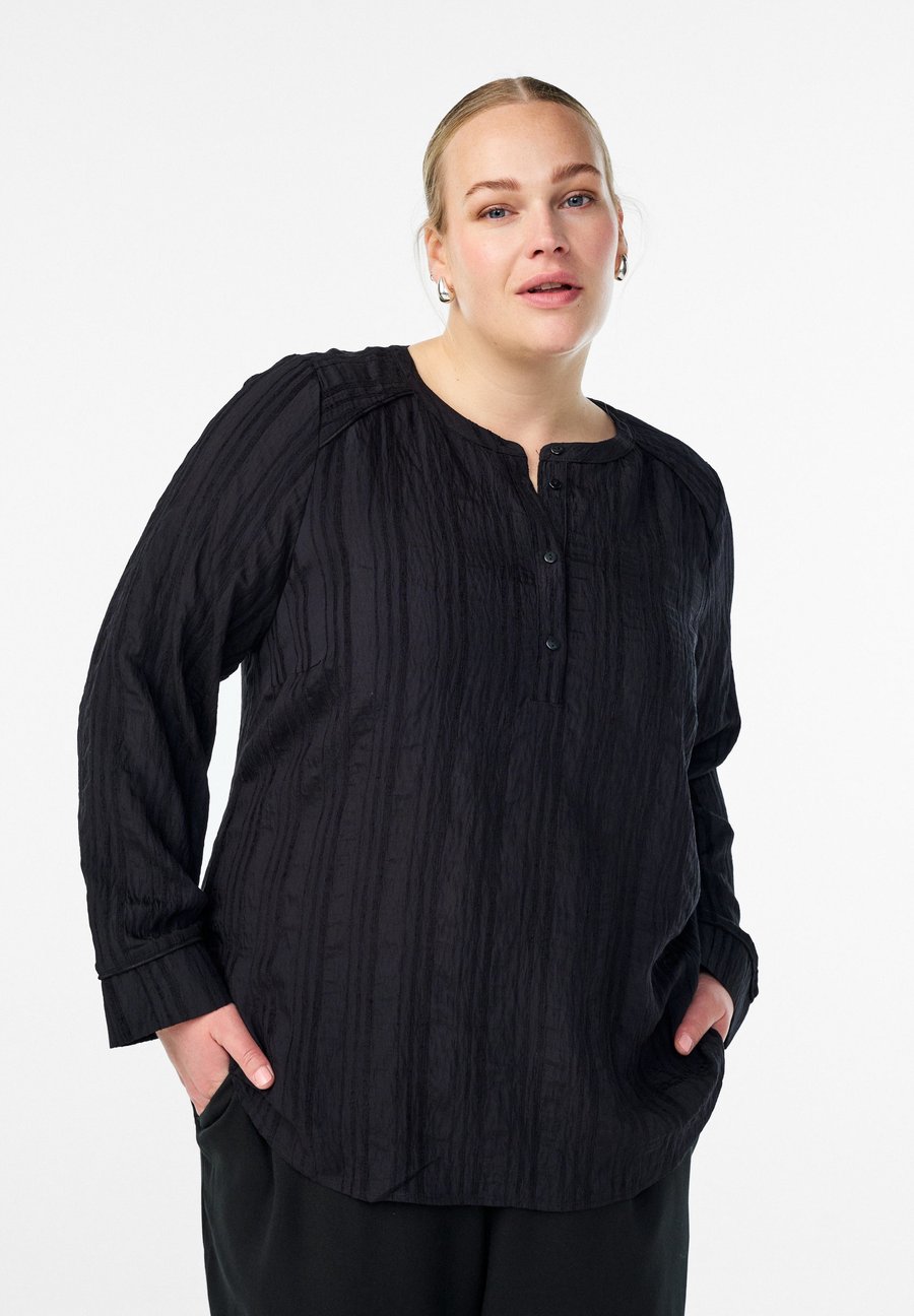 Блуза Zizzi TON-IN-TON-STRUKTUR UND KNÖPFEN, Black
Блуза Zizzi TON-IN-TON-STRUKTUR UND KNÖPFEN, Black