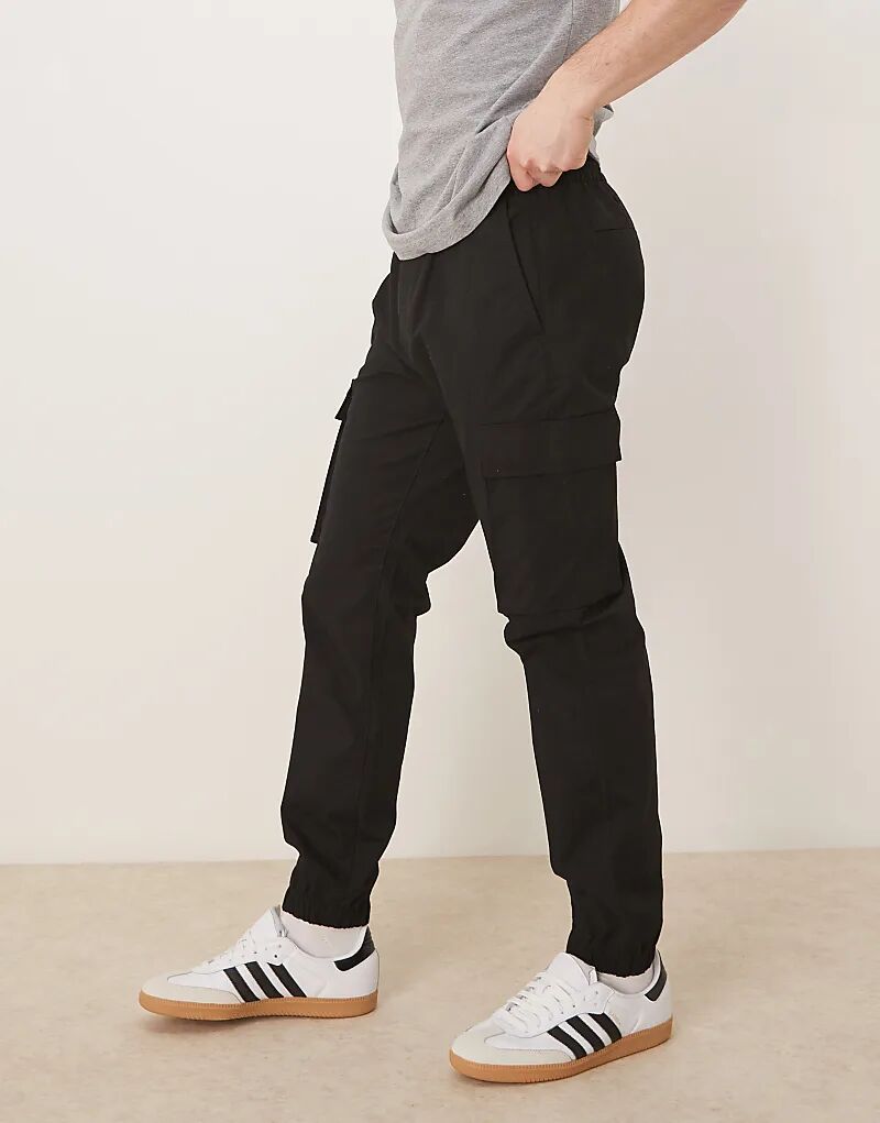 Эластичные узкие брюки Calvin Klein Jeans из рипстопа черного цвета
Эластичные узкие брюки Calvin Klein Jeans из рипстопа черного цвета