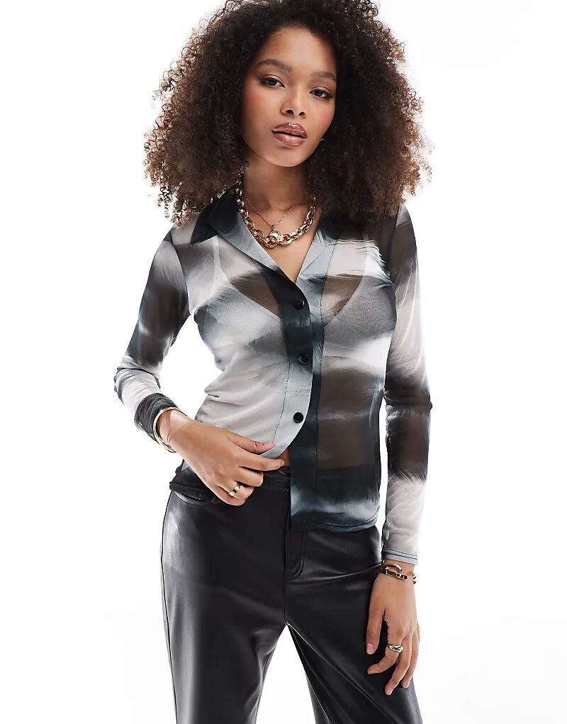 Сетчатая рубашка с монохромным мраморным принтом Style Cheat
Сетчатая рубашка с монохромным мраморным принтом Style Cheat