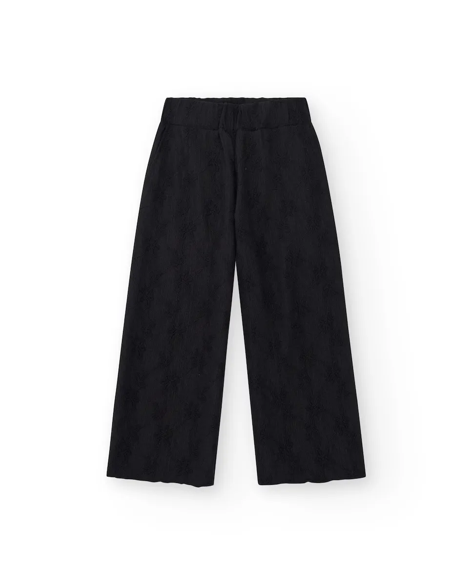 Черные брюки для девочек с эластичной талией и вышивкой Tuc tuc, черный
Черные брюки для девочек с эластичной талией и вышивкой Tuc tuc, черный