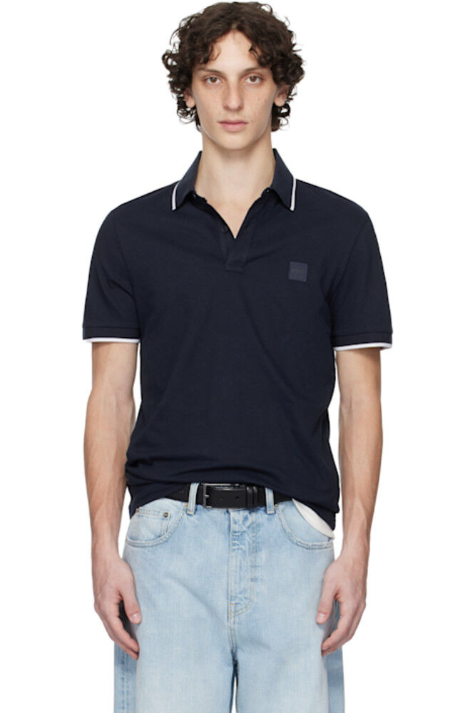 Темно-синяя облегающая футболка-поло из пике из эластичного хлопка BOSS
Темно-синяя облегающая футболка-поло из пике из эластичного хлопка BOSS