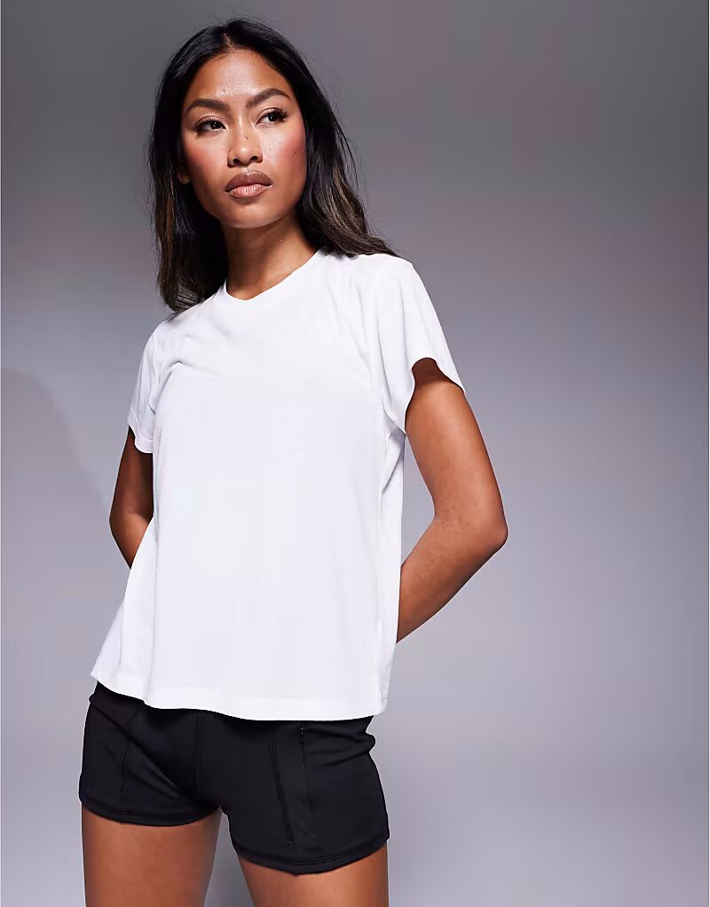 Футболка для бега из быстросохнущей сетки свободного кроя белого цвета 4505
Футболка для бега из быстросохнущей сетки свободного кроя белого цвета 4505