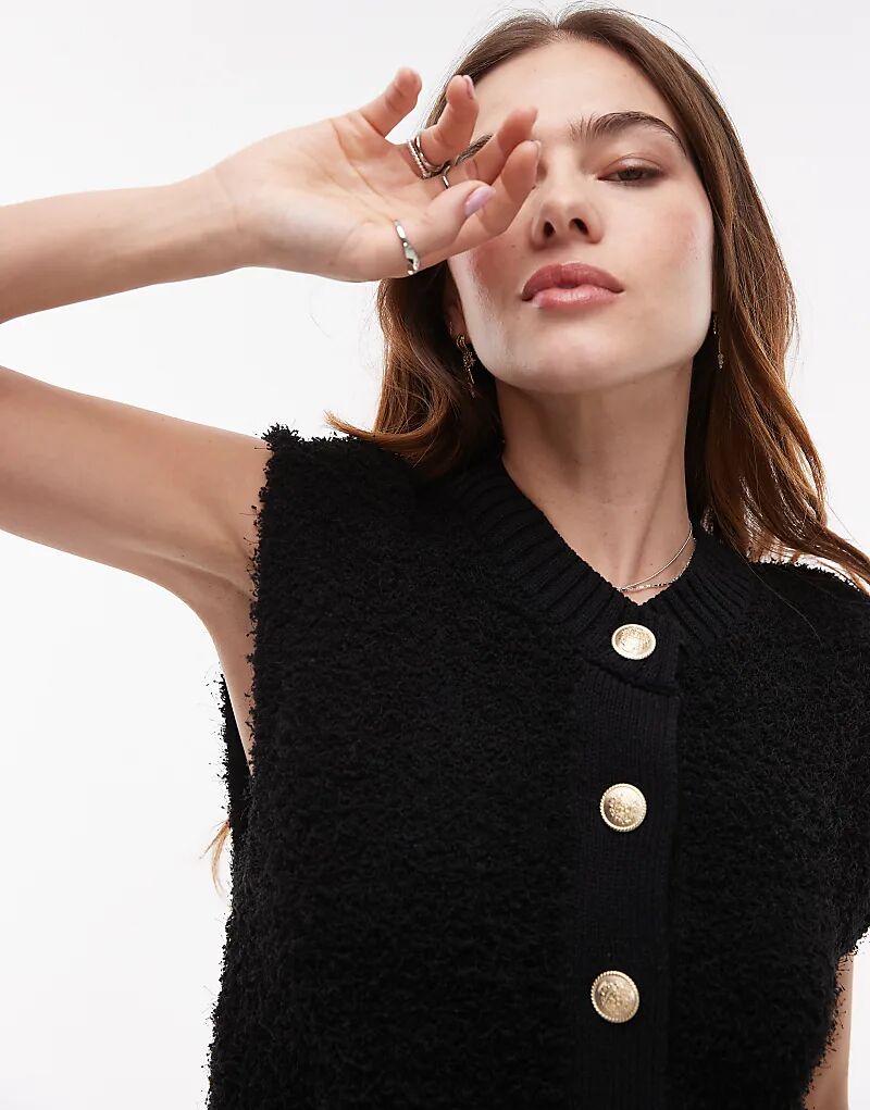 Трикотажный топ на пуговицах черного цвета Mango
Трикотажный топ на пуговицах черного цвета Mango