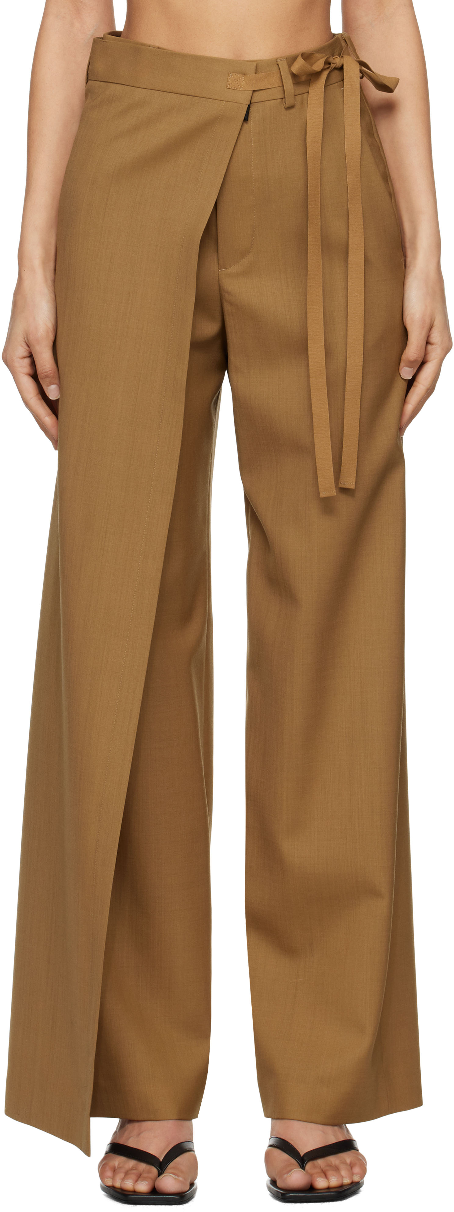 Брюки из шерстяной парусины цвета загара с завязками MM6 Maison Margiela
Брюки из шерстяной парусины цвета загара с завязками MM6 Maison Margiela