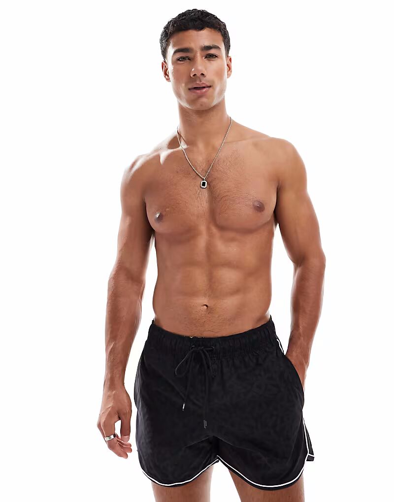 Купальные шорты DKNY Cook темно-синего цвета
Купальные шорты DKNY Cook темно-синего цвета