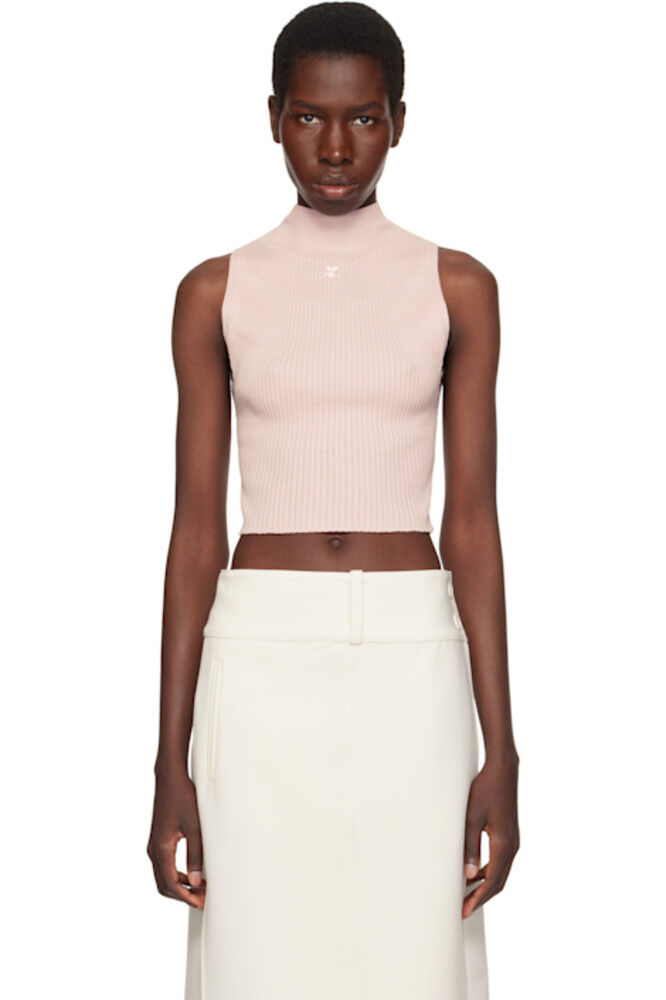 Розовый топ с воротником-стойкой и легкой отделкой в рубчик Courrèges
Розовый топ с воротником-стойкой и легкой отделкой в рубчик Courrèges