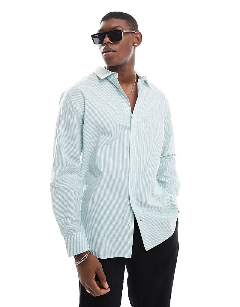 Пляжная рубашка с длинными рукавами в полоску из сирсакера зеленого и белого цветов Sol Beach
Пляжная рубашка с длинными рукавами в полоску из сирсакера зеленого и белого цветов Sol Beach