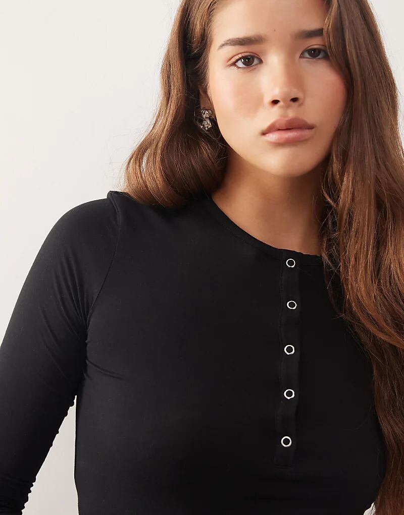 Лонгслив хенли с длинными рукавами черного цвета Weekday
Лонгслив хенли с длинными рукавами черного цвета Weekday