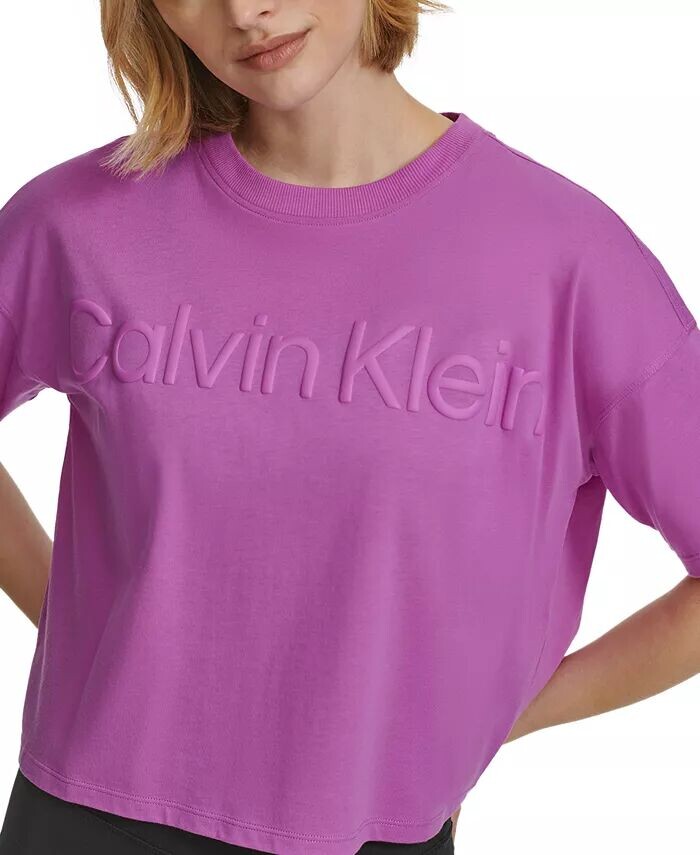 Женская хлопковая укороченная футболка с рельефным логотипом Calvin Klein, розовый
Женская хлопковая укороченная футболка с рельефным логотипом Calvin Klein, розовый