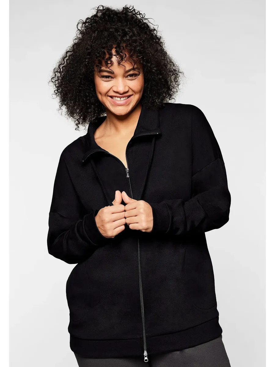 Толстовка Sheego "больших размеров" с воротником стойкой и ремешком для завязывания, черный
Толстовка Sheego "больших размеров" с воротником стойкой и ремешком для завязывания, черный