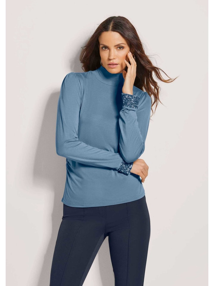 MADELEINE Элегантная футболка с длинными рукавами и воротником-стойкой дымчато-синего цвета
MADELEINE Элегантная футболка с длинными рукавами и воротником-стойкой дымчато-синего цвета