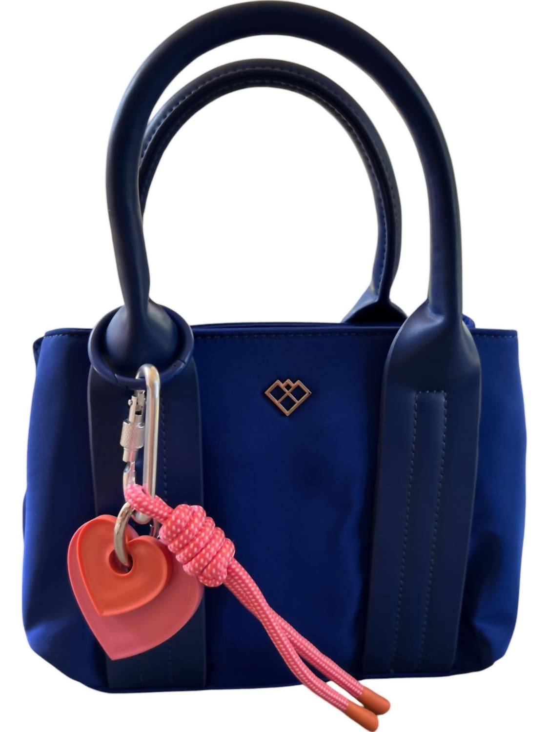 Женская синяя сумка-кроссбоди с подвесками Carrier Co.
Женская синяя сумка-кроссбоди с подвесками Carrier Co.