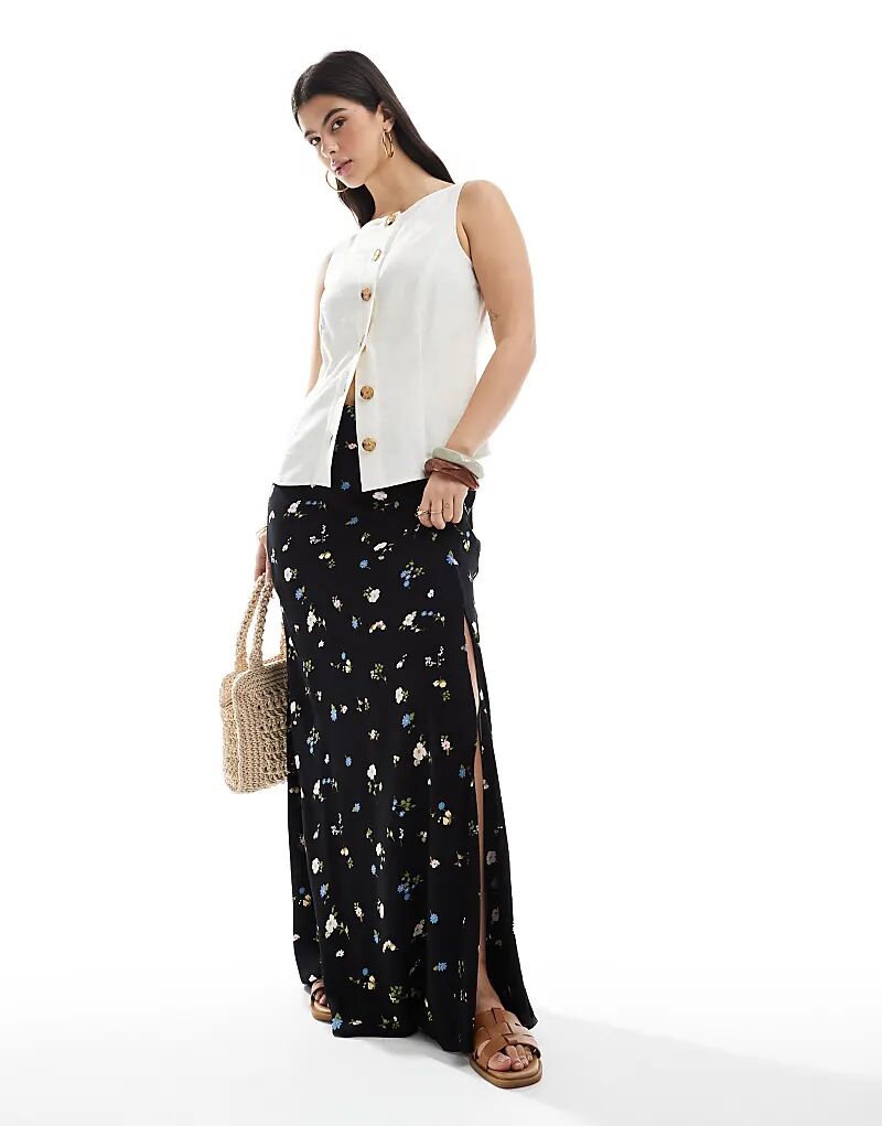 Юбка макси ASOS DESIGN с высоким разрезом и цветочным принтом
Юбка макси ASOS DESIGN с высоким разрезом и цветочным принтом