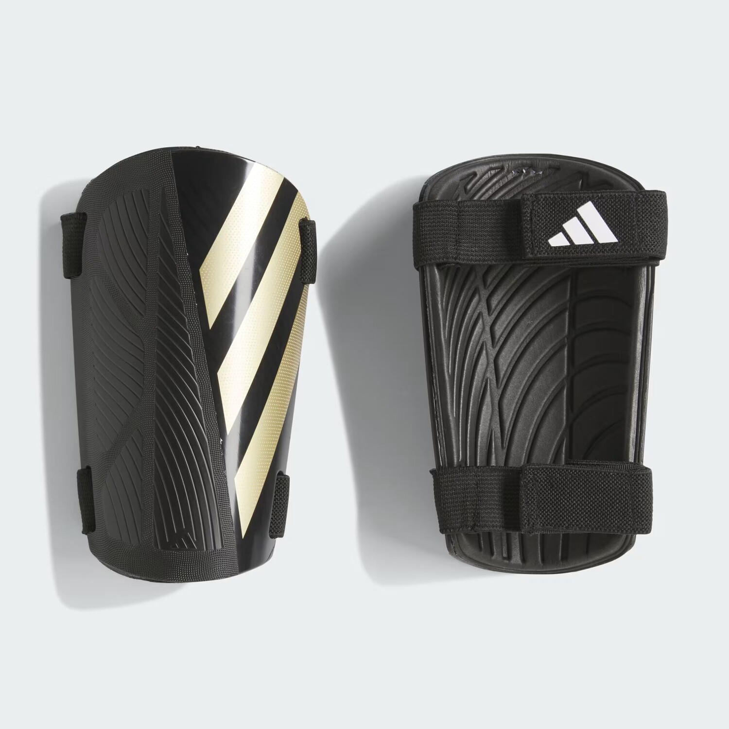 Tiro Training Щитки для голени Adidas, цвет Black/Gold Metallic/White
Tiro Training Щитки для голени Adidas, цвет Black/Gold Metallic/White