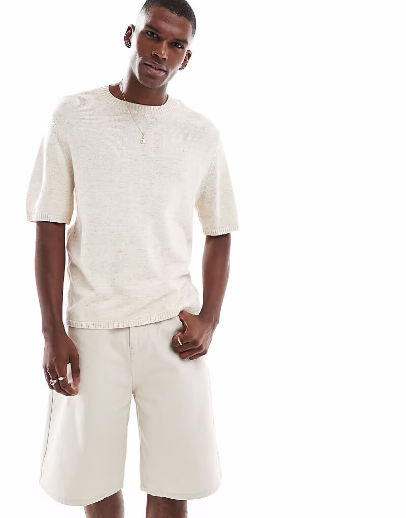 Трикотажный топ Hollister с короткими рукавами бежевого цвета 
Трикотажный топ Hollister с короткими рукавами бежевого цвета