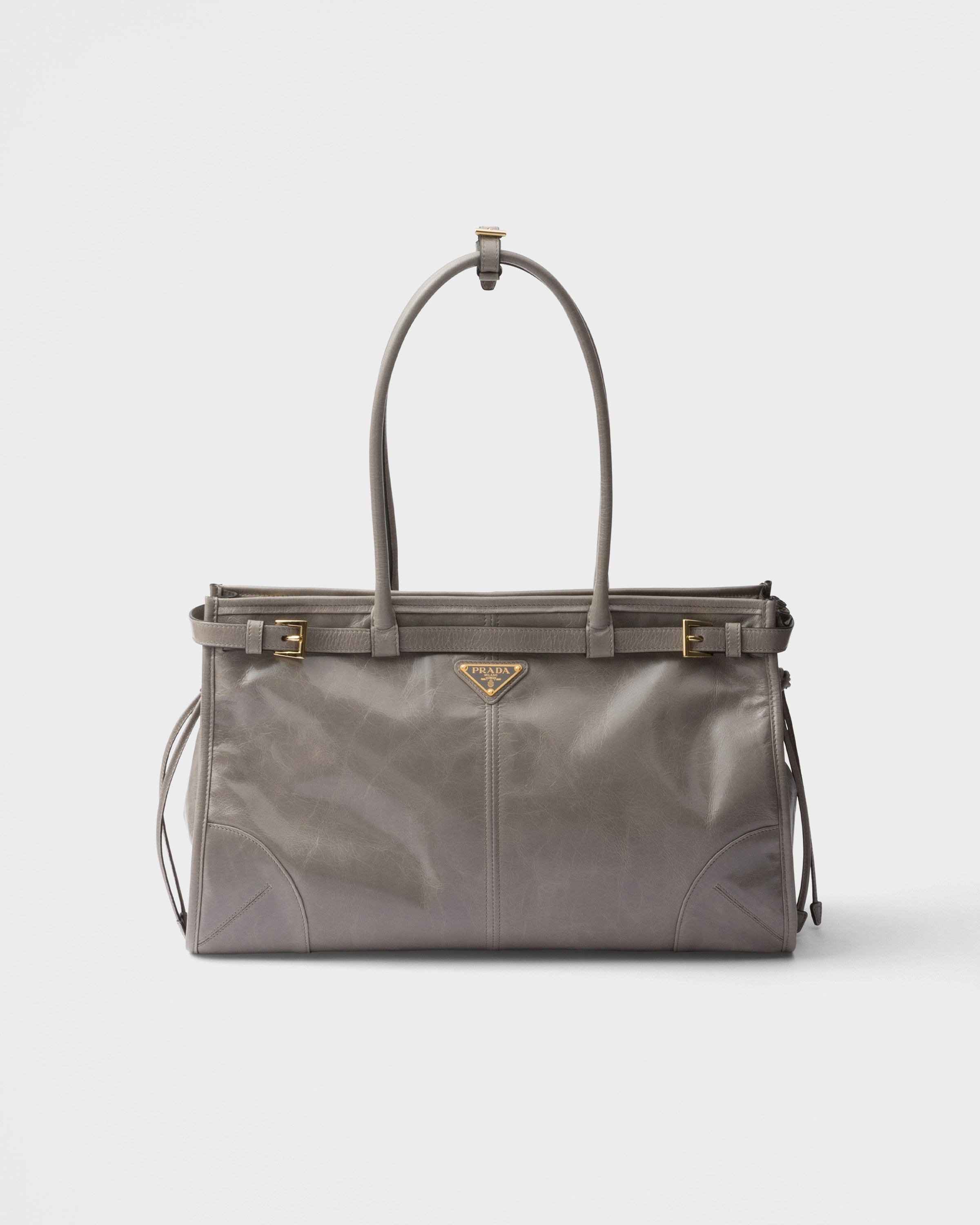 Большая кожаная сумка Prada Bonnie Prada, серебристо-серый
Большая кожаная сумка Prada Bonnie Prada, серебристо-серый