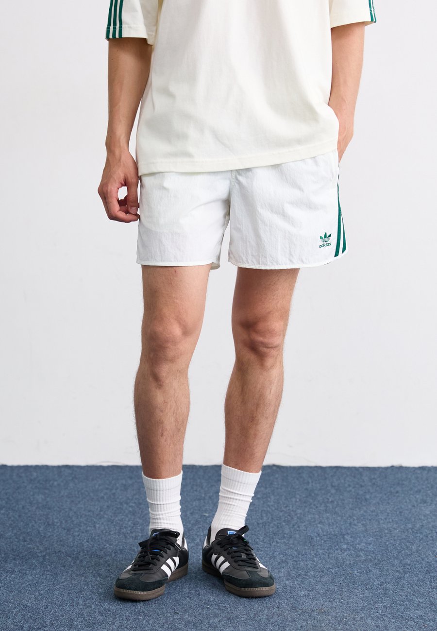 Шорты Adidas Originals SPRINTER, Off White/Collegiate Green/White
Шорты Adidas Originals SPRINTER, Off White/Collegiate Green/White