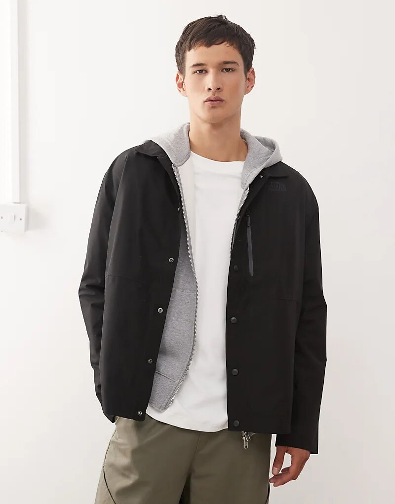 Черная рубашка на пуговицах с логотипом NSE Tech от North Face
Черная рубашка на пуговицах с логотипом NSE Tech от North Face