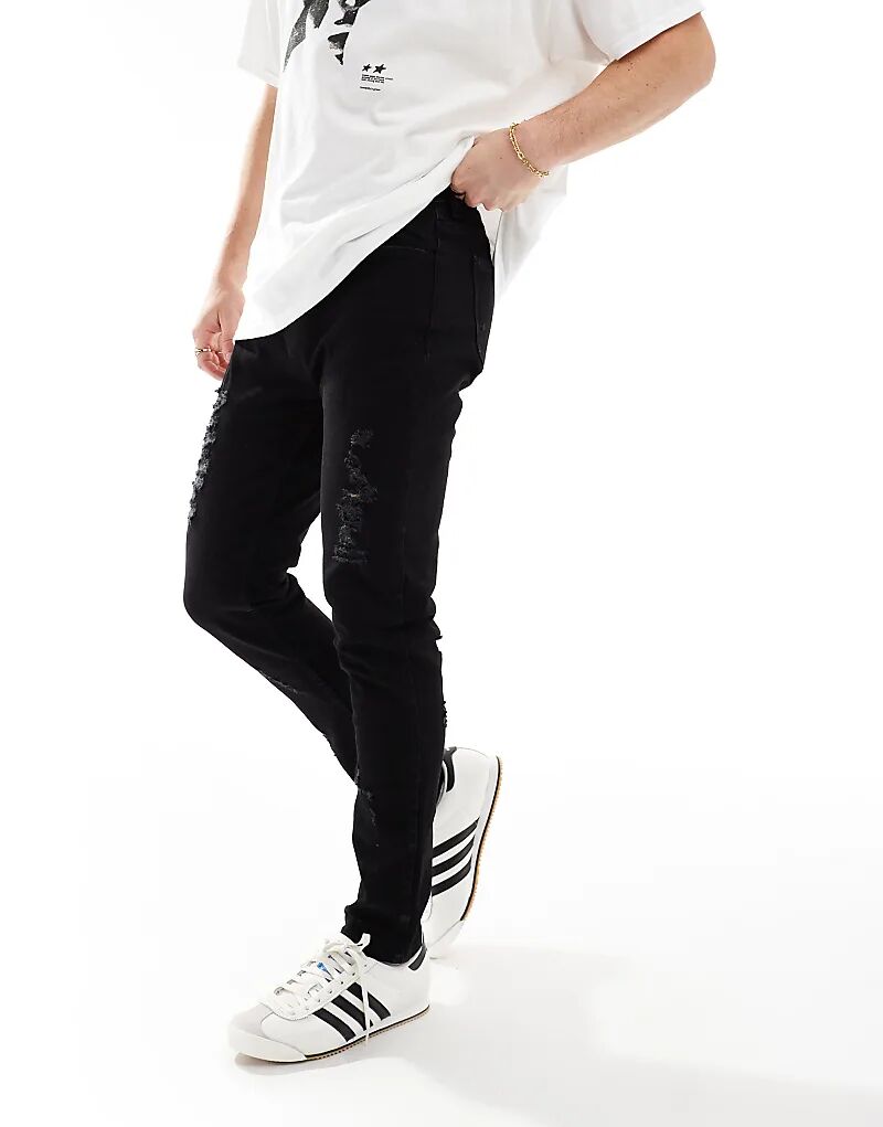 Потертые облегающие джинсы черного цвета Hera
Потертые облегающие джинсы черного цвета Hera