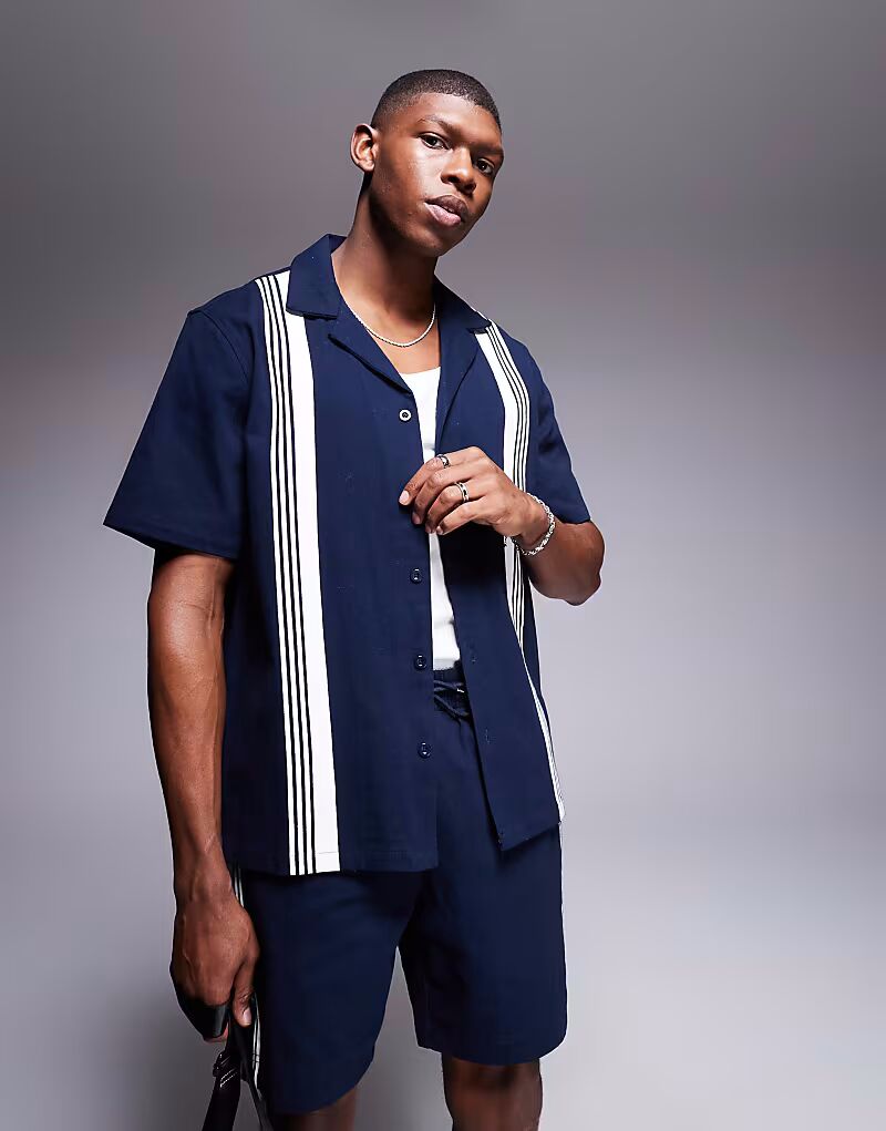 Рубашка с короткими рукавами и полосками Alma De Ace темно-синего цвета
Рубашка с короткими рукавами и полосками Alma De Ace темно-синего цвета