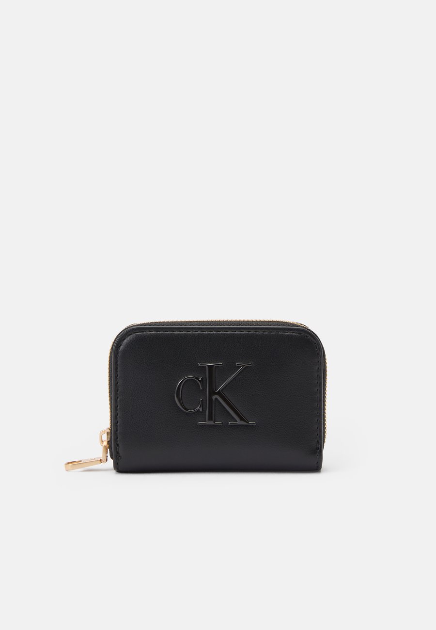 Кошелек Calvin Klein BOLD MEDIUM ZIP AROUND, Black
Кошелек Calvin Klein BOLD MEDIUM ZIP AROUND, Black