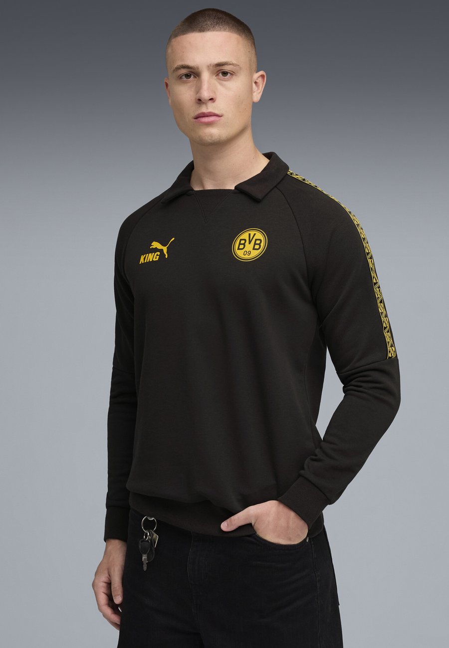 Топ Puma BVB KING DRILL , Black Yellow Sizzle/Black
Топ Puma BVB KING DRILL , Black Yellow Sizzle/Black