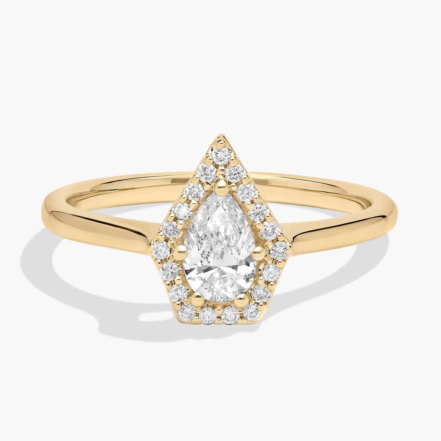 Кольцо с бриллиантами в форме груши и пятью гранями из желтого золота 14 карат (1/2 карата). Blue Nile