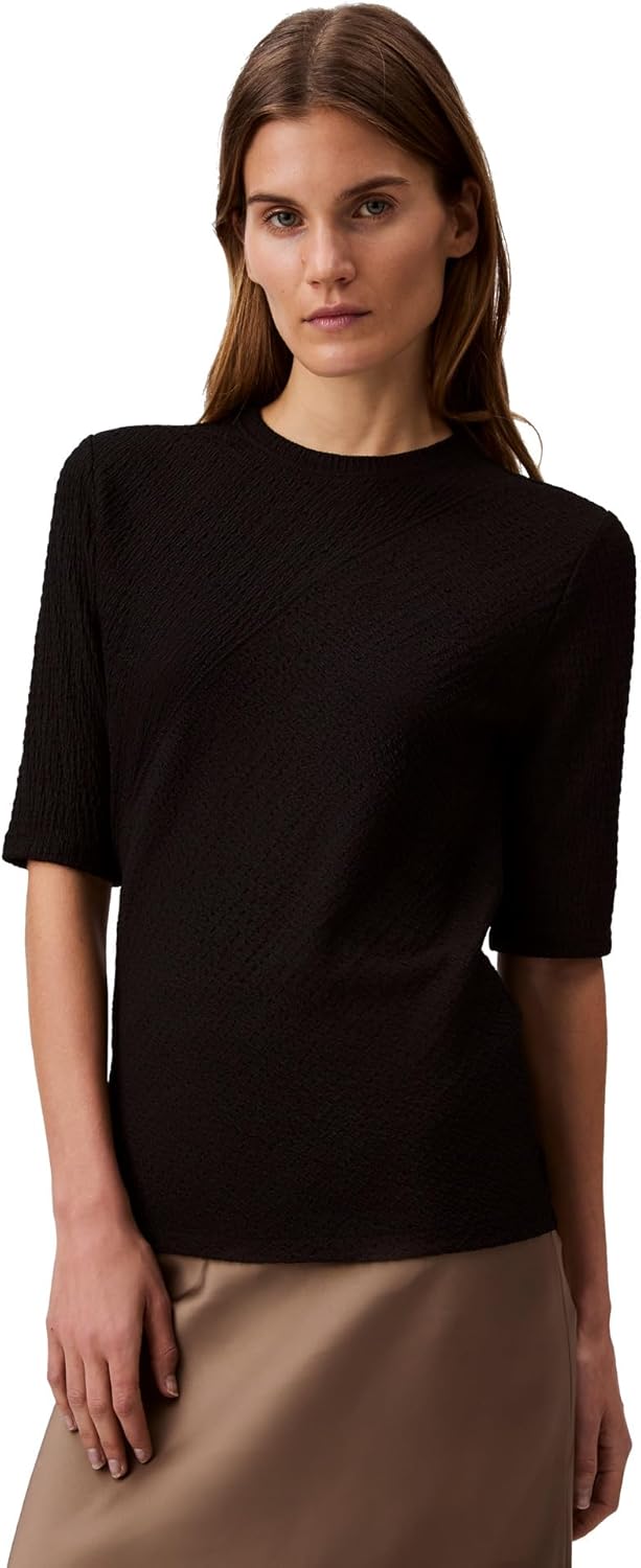 Женский текстурированный трикотажный топ Calvin Klein Jeans с рукавами 3/4, Black
Женский текстурированный трикотажный топ Calvin Klein Jeans с рукавами 3/4, Black