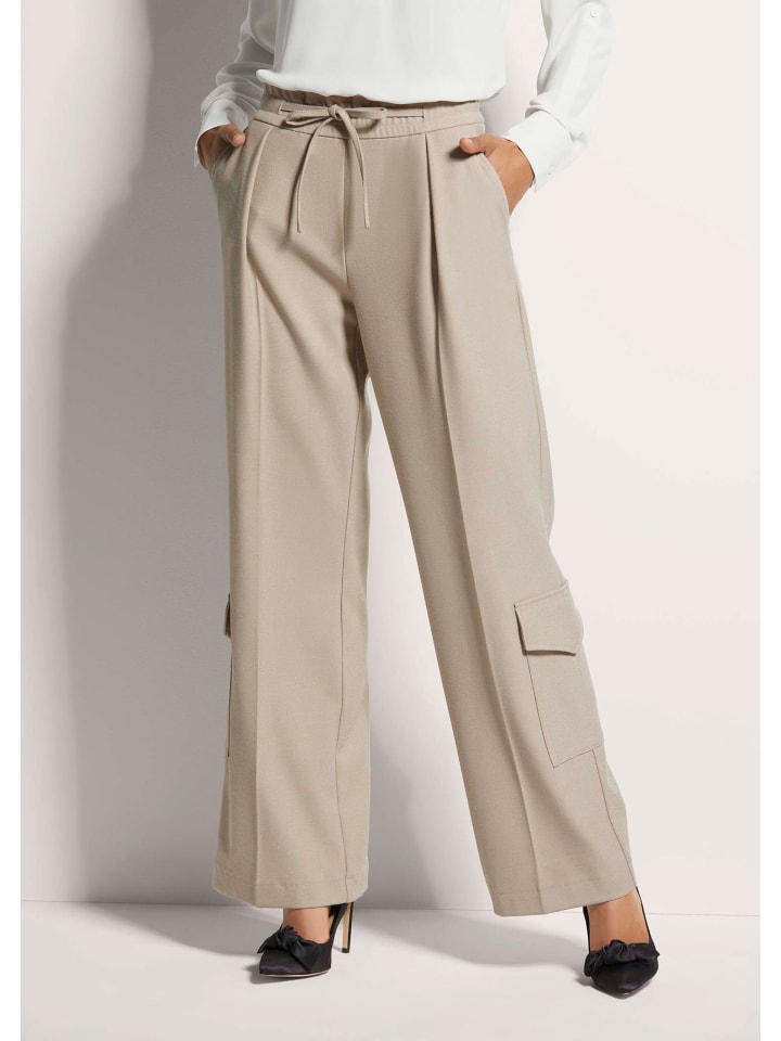 MADELEINE Брюки-карго в берберском стиле, надеваемые через голову
MADELEINE Брюки-карго в берберском стиле, надеваемые через голову