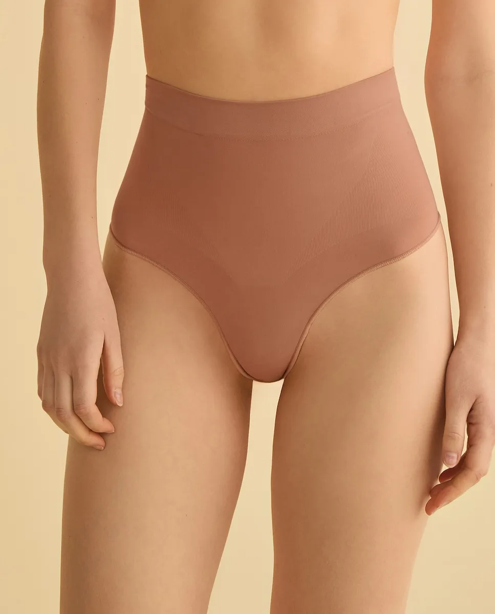 Женские формирующие бесшовные трусики-стринги Énfasis, светло-коричневый
Женские формирующие бесшовные трусики-стринги Énfasis, светло-коричневый