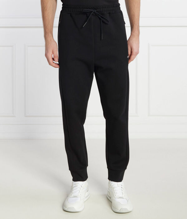 Спортивные штаны мужские Boss Green зауженные на кулиске, черный
Спортивные штаны мужские Boss Green зауженные на кулиске, черный