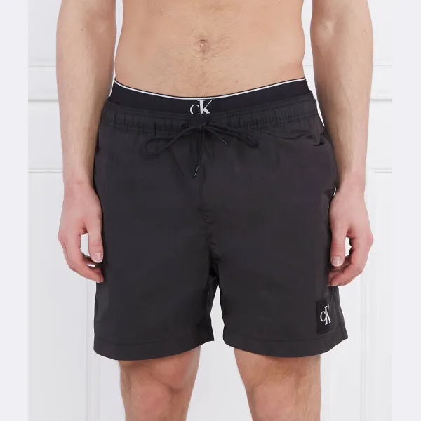 Купальные шорты стандартного кроя Calvin Klein, черный
Купальные шорты стандартного кроя Calvin Klein, черный