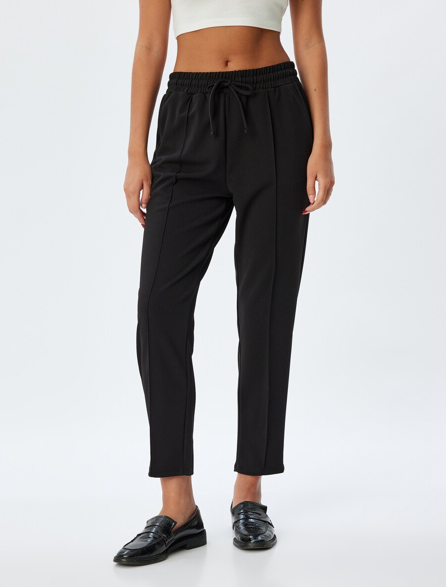 Брюки зауженного кроя Koton, черный
Брюки зауженного кроя Koton, черный