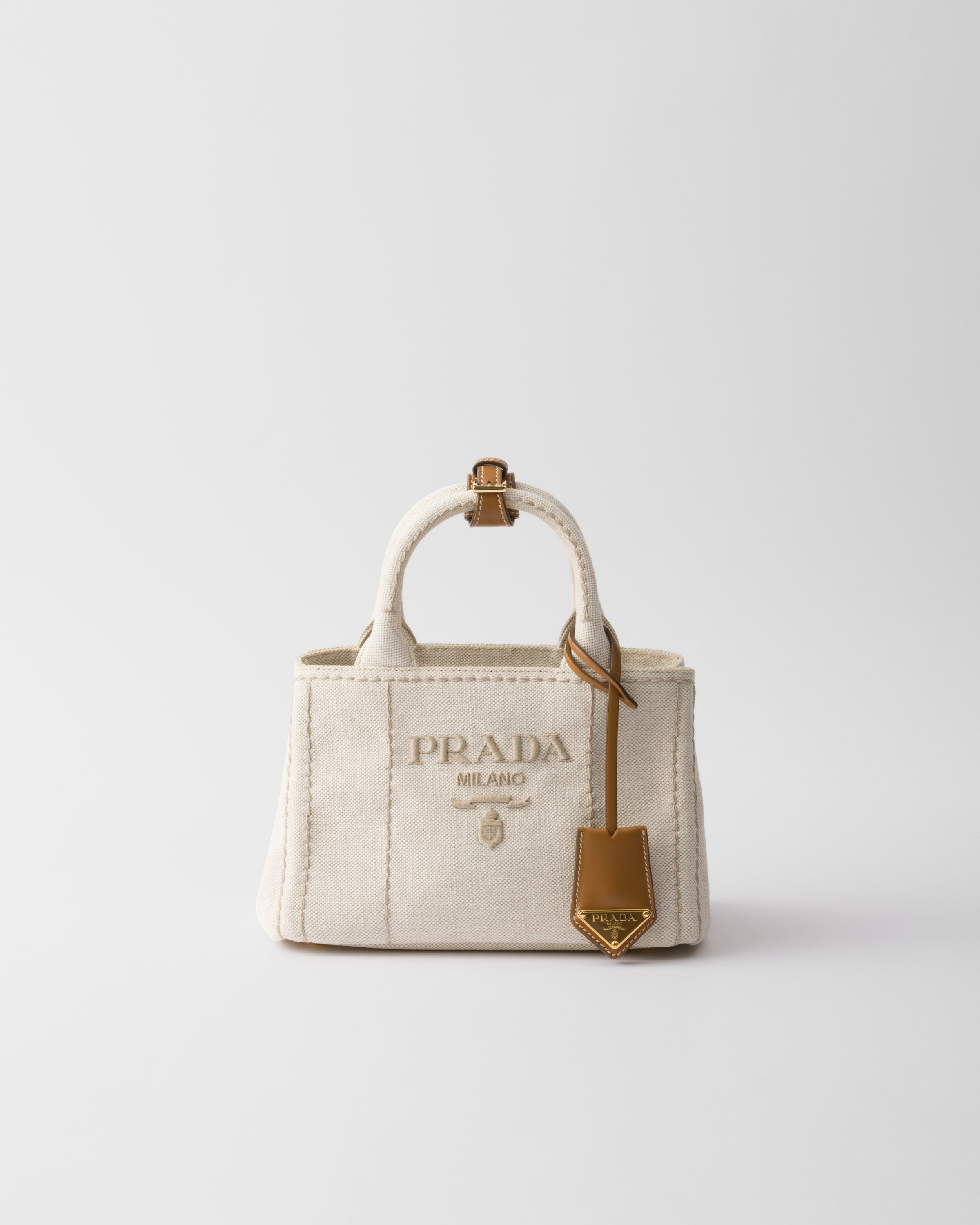 Мини-сумка Prada Jardinière из смеси льна, бежевый
Мини-сумка Prada Jardinière из смеси льна, бежевый