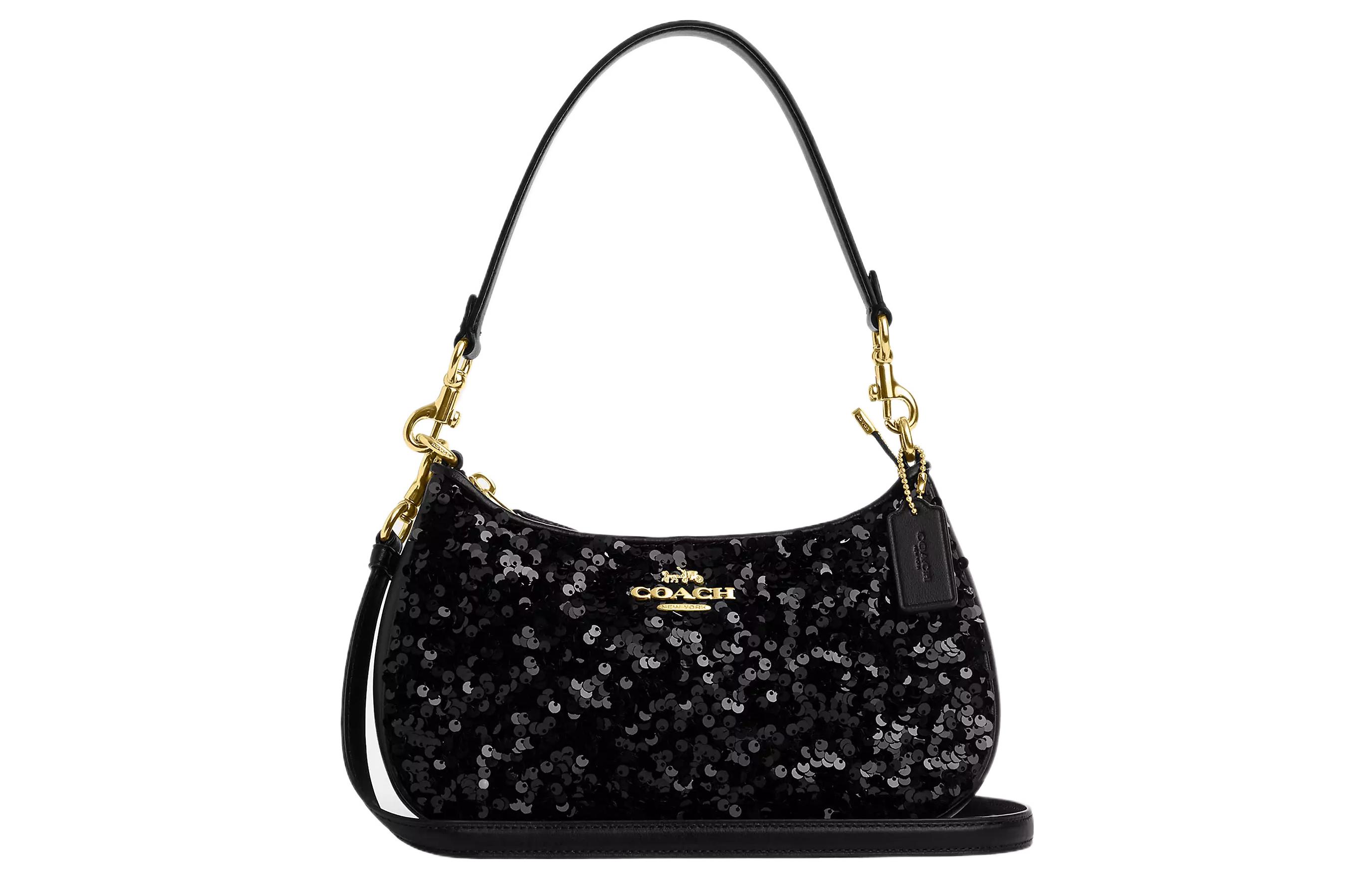 Сумка через плечо Teri Plastic с элементами из спилка черная COACH
Сумка через плечо Teri Plastic с элементами из спилка черная COACH