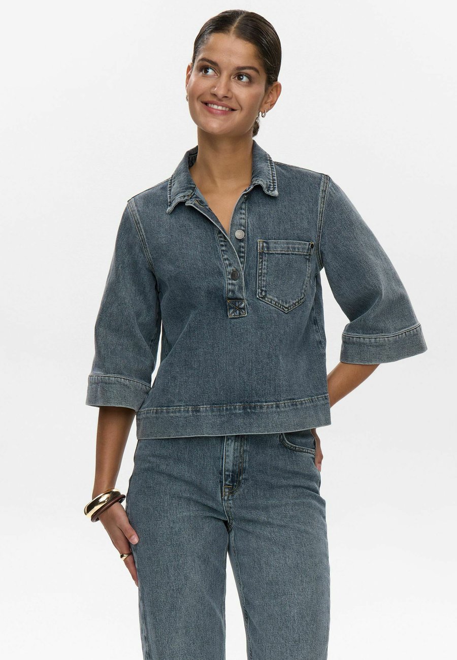Блуза Nümph Blouse, Med Blue Washed Denim/Blue Denim
Блуза Nümph Blouse, Med Blue Washed Denim/Blue Denim