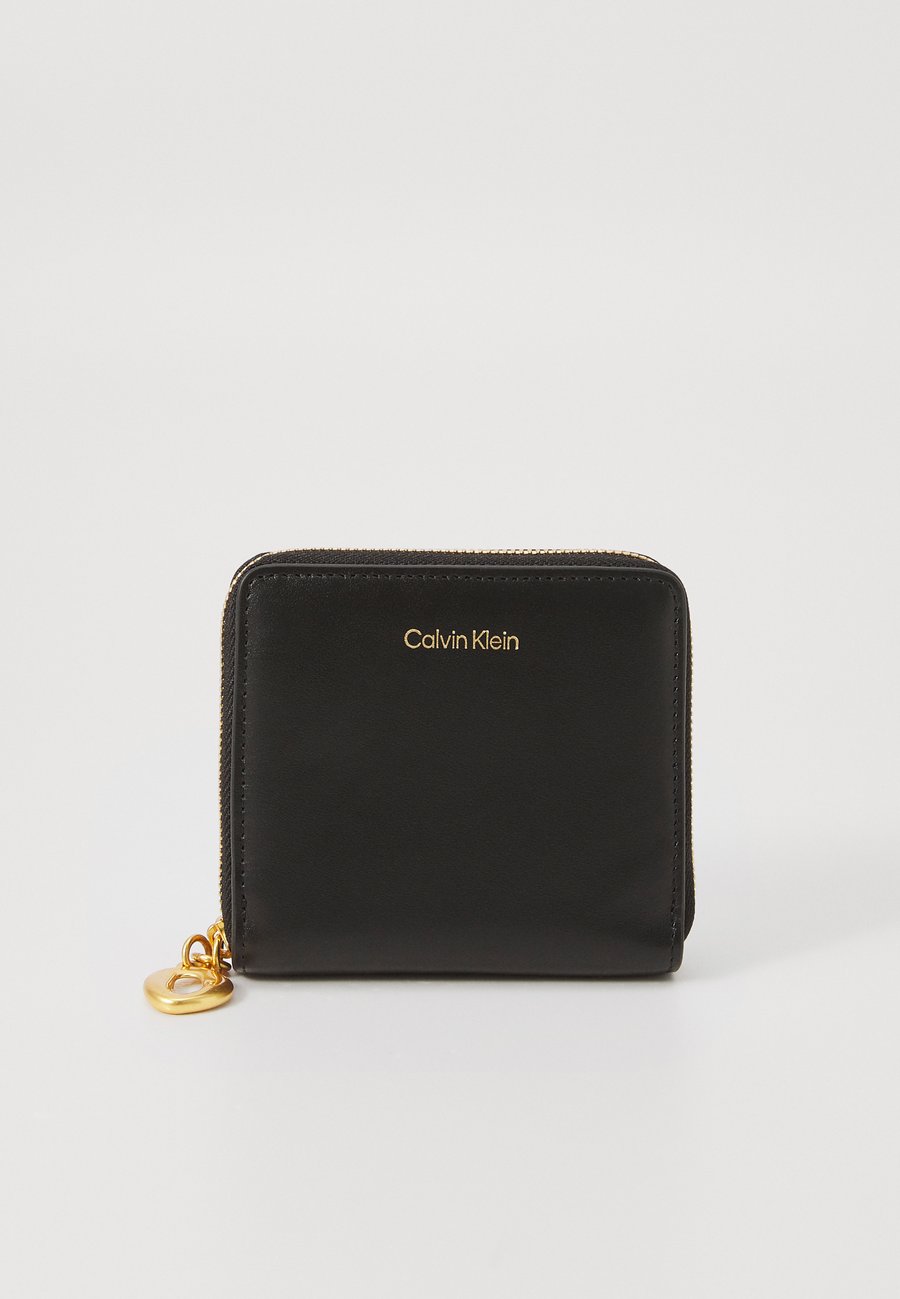 Кошелек Calvin Klein ENGRAVED, Black
Кошелек Calvin Klein ENGRAVED, Black