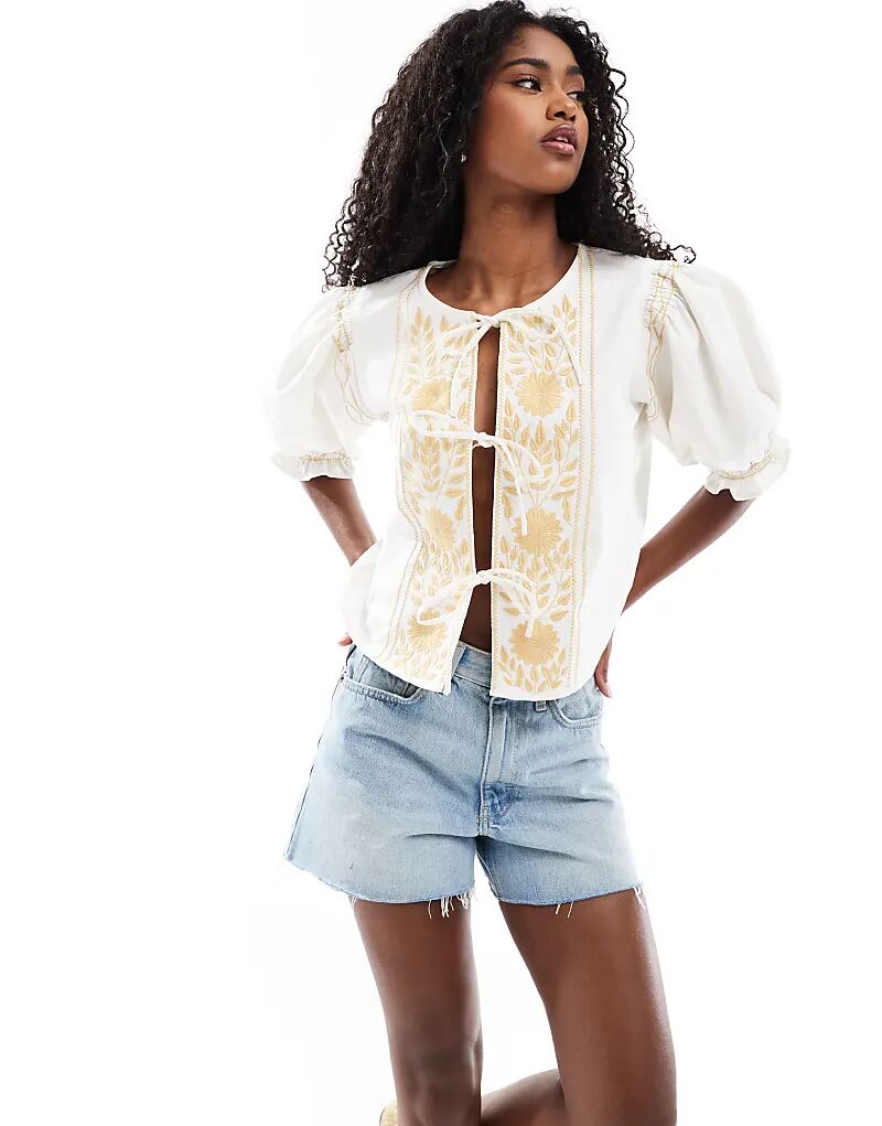 Топ ASOS DESIGN с завязкой спереди, вышивкой и вставками из шитья
Топ ASOS DESIGN с завязкой спереди, вышивкой и вставками из шитья