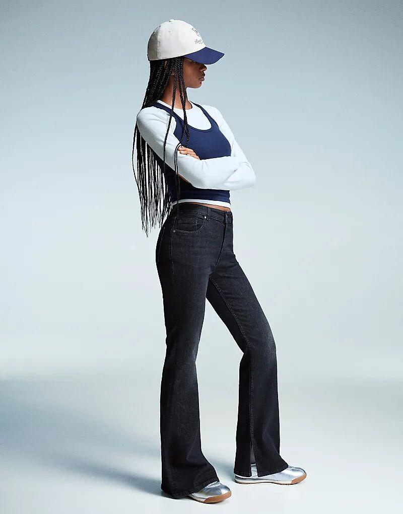 Джинсы Bershka клеш с разрезом черного цвета
Джинсы Bershka клеш с разрезом черного цвета