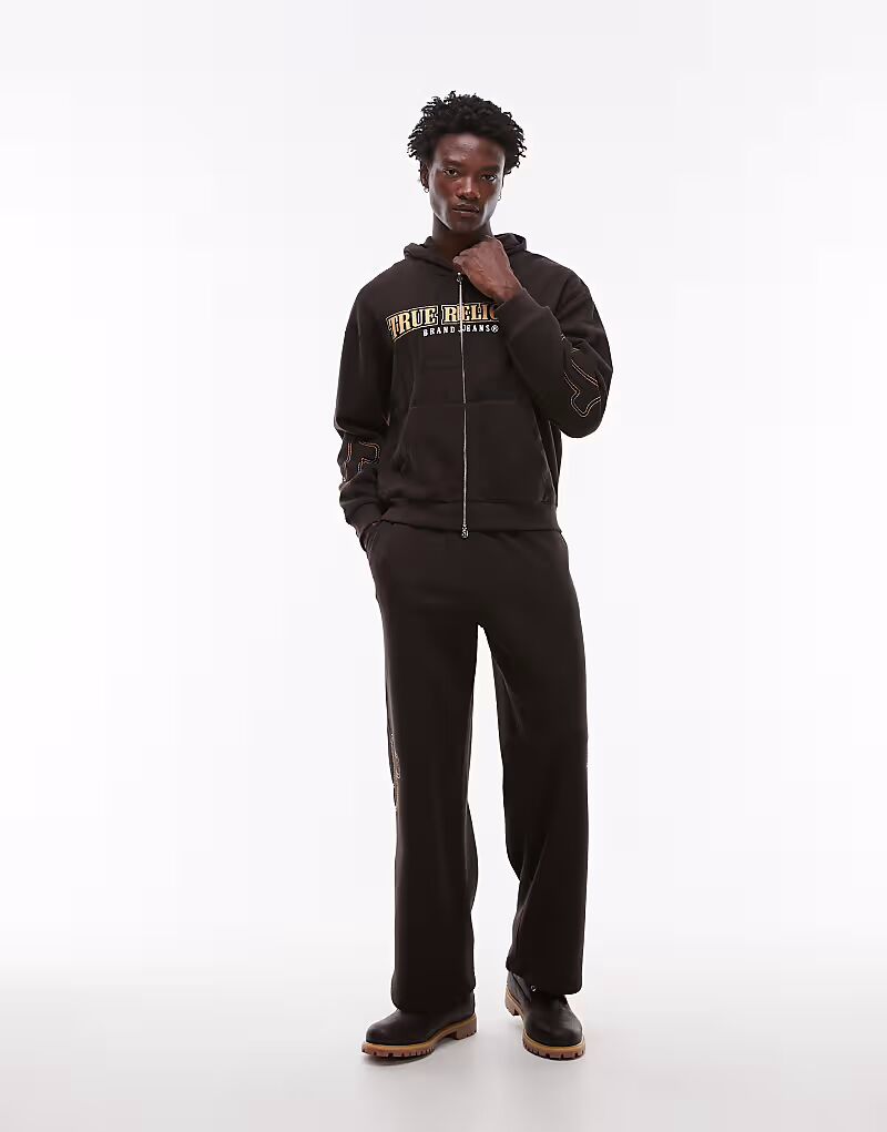 Свободные спортивные брюки с логотипом Big T коричневого цвета True Religion
Свободные спортивные брюки с логотипом Big T коричневого цвета True Religion